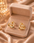 Gold-Tone Open Heart Stud Earrings with Baguette Crystals